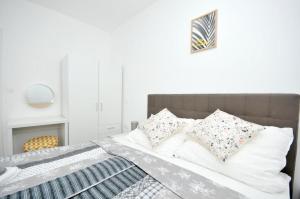 Posteľ alebo postele v izbe v ubytovaní Villa Carolina + 20 fotografií
