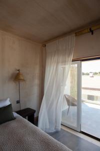 Cama ou camas em um quarto em Azenhas do Mar Valley House