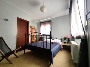 Postel nebo postele na pokoji v ubytování Gaia Guest House