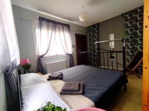 Postel nebo postele na pokoji v ubytování Gaia Guest House