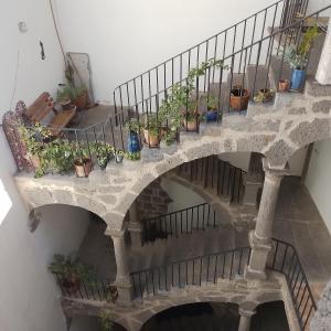 a stairway with potted plants on it at 3 bedroom apartment overlooking river in Agde