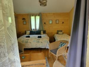Letto o letti in una camera di Source Nature