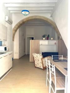 Kuchyň nebo kuchyňský kout v ubytování Open space a Carloforte