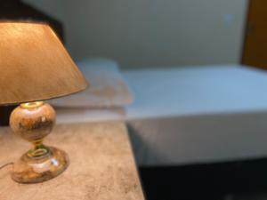 Postel nebo postele na pokoji v ubytování Bertolini Hotel