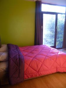 Un pat sau paturi într-o cameră la Holiday home El Campo