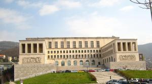 a large building with a lot of windows at Apt by Trieste University in Trieste