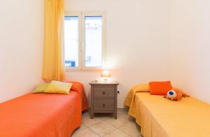 Ένα ή περισσότερα κρεβάτια σε δωμάτιο στο via dessi Orosei