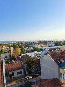 an aerial view of a city with buildings at Apartman Filip Novi Sad in Novi Sad