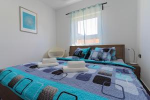 Postel nebo postele na pokoji v ubytování APARTMÁNY POD SJEZDOVKOU