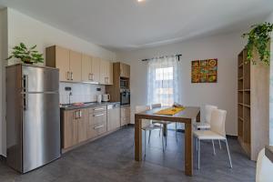 Kuchyň nebo kuchyňský kout v ubytování APARTMÁNY POD SJEZDOVKOU