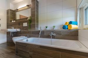 Koupelna v ubytování APARTMÁNY POD SJEZDOVKOU