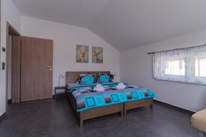 Postel nebo postele na pokoji v ubytování APARTMÁNY POD SJEZDOVKOU