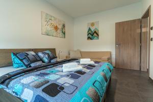 Postel nebo postele na pokoji v ubytování APARTMÁNY POD SJEZDOVKOU
