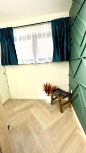 a room with a table and a window at Apartament 21 (1) in Szczyrk