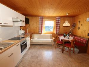 A kitchen or kitchenette at Ferienhaus Türtscher 2