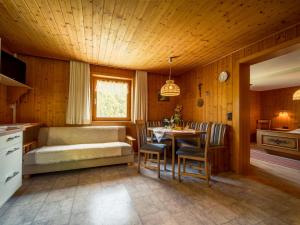 A bed or beds in a room at Ferienhaus Türtscher 2