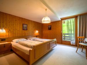 A bed or beds in a room at Ferienhaus Türtscher 2