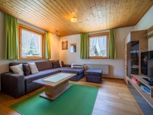 TV a/nebo společenská místnost v ubytování Ferienhaus Türtscher 1