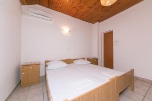 Postel nebo postele na pokoji v ubytování Apartment Podaca 4734b
