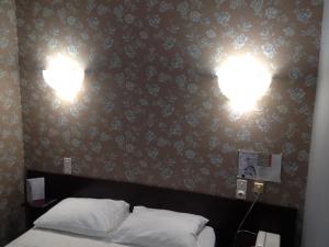 Postel nebo postele na pokoji v ubytování Hotel Du Nord