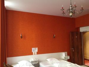 Postel nebo postele na pokoji v ubytování Hotel Du Nord