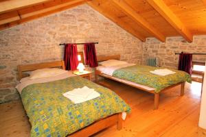 Postelja oz. postelje v sobi nastanitve Family friendly house with a swimming pool Orihi, Central Istria - Sredisnja Istra - 3415