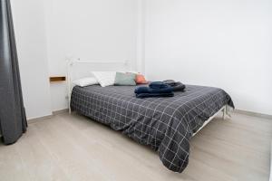 Postel nebo postele na pokoji v ubytování Casa Raquel