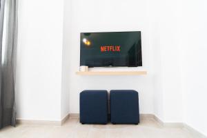 TV a/nebo společenská místnost v ubytování Casa Raquel
