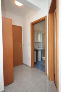 an empty room with a bathroom with a sink at Apartments by the sea Medveja, Opatija - 3430 in Medveja