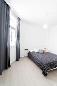 Postel nebo postele na pokoji v ubytování Casa Raquel