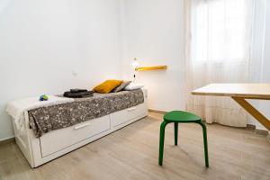 Postel nebo postele na pokoji v ubytování Casa Raquel