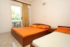 Posteľ alebo postele v izbe v ubytovaní Apartments with a parking space Podaca, Makarska - 4747