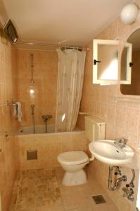 Kúpeľňa v ubytovaní Apartment Podgora 2714a