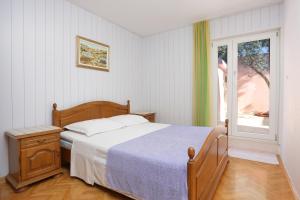 Posteľ alebo postele v izbe v ubytovaní Apartment Duce 2737a