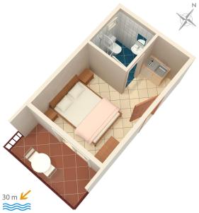 a floor plan of a room with a bed at Studio Duce 2746b in Duće