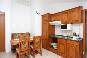 Kuchyňa alebo kuchynka v ubytovaní Apartment Stanici 2818d