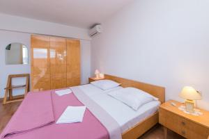 Posteľ alebo postele v izbe v ubytovaní Studio Brela 2752c