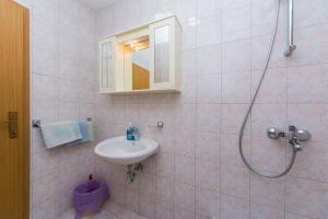 Kúpeľňa v ubytovaní Studio Brela 2752c