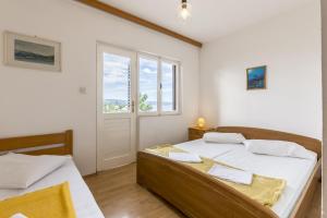 Fotografia z galérie ubytovania Apartments by the sea Stanici, Omis - 3064 v Omise
