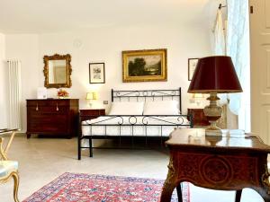 Ένα ή περισσότερα κρεβάτια σε δωμάτιο στο Casa Marchisio