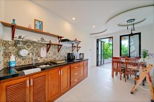 Køkken eller tekøkken på Green Meadows Boutique Apartments