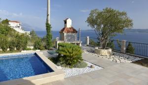 Fotografia z galérie ubytovania Family friendly house with a swimming pool Mimice, Omis - 4644 v Mimiciach