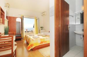 Fotografia z galérie ubytovania Apartments with a parking space Baska Voda, Makarska - 4759 v destinácii Baška Voda