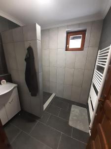 Kúpeľňa v ubytovaní Szilvaliget Vendégház