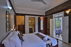 Voodi või voodid majutusasutuse Chithirapuram Palace toas