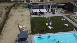 The swimming pool at or close to RESORT REIS country house