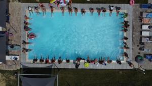 The swimming pool at or close to RESORT REIS country house
