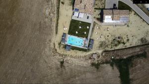 The swimming pool at or close to RESORT REIS country house