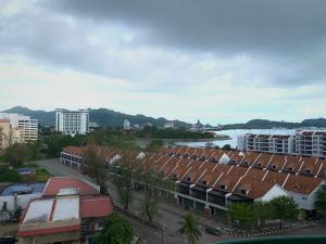 an aerial view of a city with a river and buildings at Newly Renovated Seaview 3BR - 8Pax Baby Friendly in Kuah
