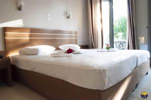 Postel nebo postele na pokoji v ubytování Hotel Sias Resort